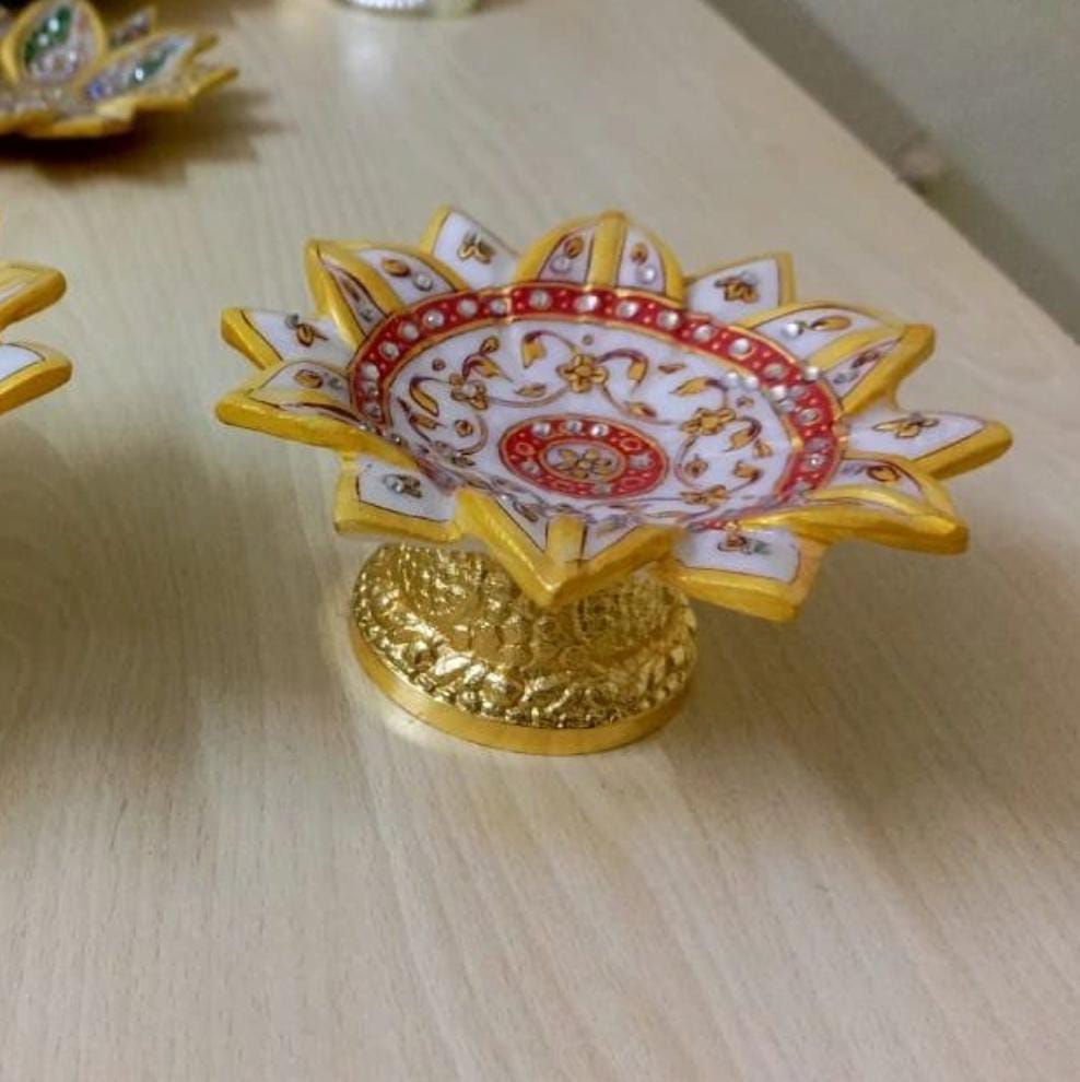 white marble hand painted lotus urli bowl with golden metal stand for home décor